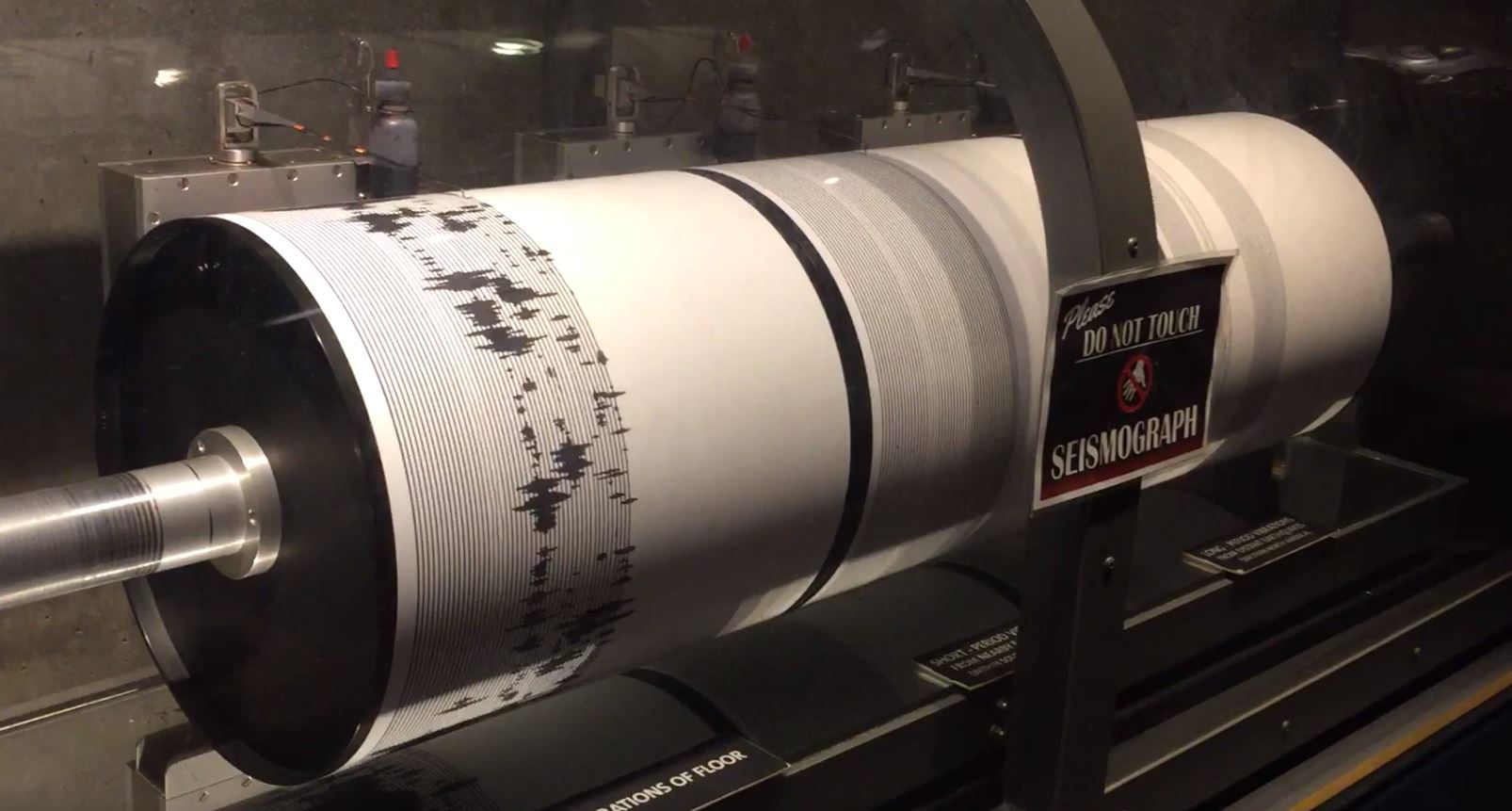 Volcanoes and earthquakes showing a seismograph measuring an earthquake.